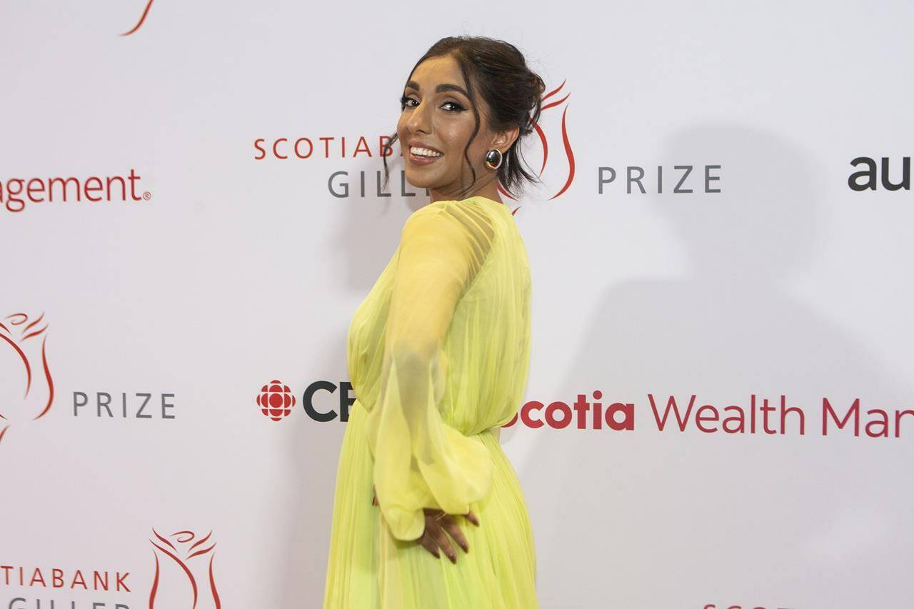 Rupi Kaur arrives on the red carpet for the 2021 Scotiabank Giller Prize in Toronto on Monday, Nov. 8, 2021. Canada’s literati are folding up their reading glasses and breaking out their finest garb ahead of tonight’s Scotiabank Giller Prize. THE CANADIAN PRESS/Chris Young