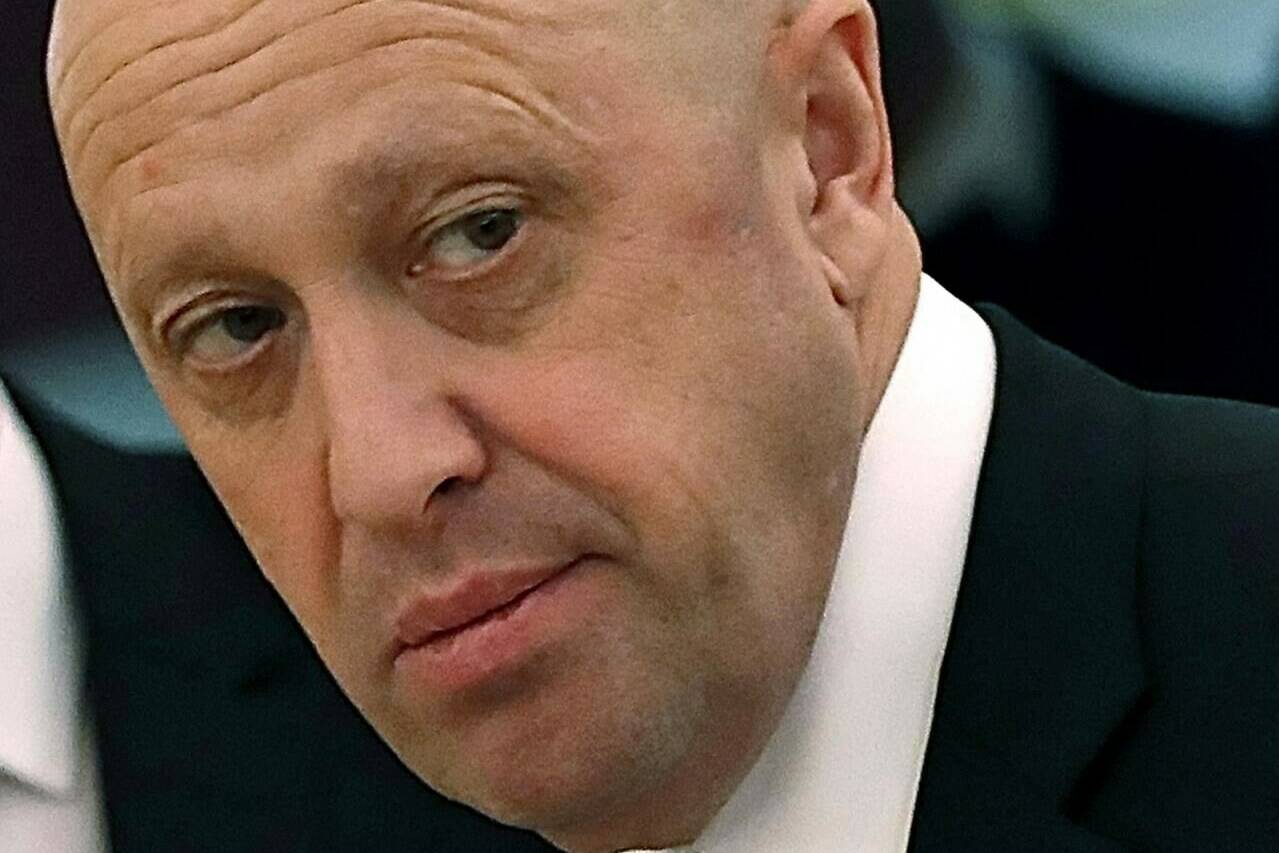 FILE - Russian businessman Yevgeny Prigozhin is shown prior to a meeting of Russian President Vladimir Putin and Chinese President Xi Jinping in the Kremlin in Moscow, Russia, on Tuesday, July 4, 2017. Prigozhin, an entrepreneur known as “Putin’s chef” because of his catering contracts with the Kremlin, has admitted he interfered in U.S. elections and says he will continue to do so — for the first time confirming the accusations he has been rejecting for years. “We have interfered, are interfering and will continue to interfere. (Sergei Ilnitsky/Pool Photo via AP, File)