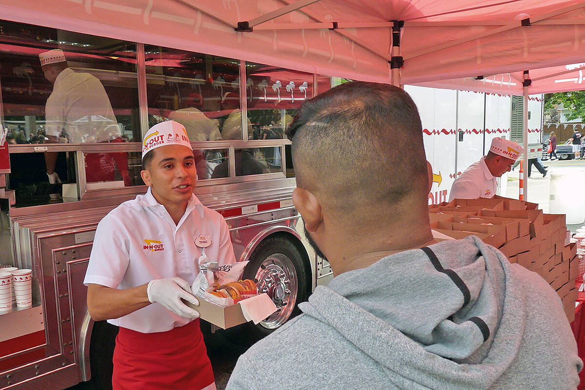 Burgers were served up at the In-N-Out mobile restaurant in Aldergrove during the 2018 Langley Good Times-Cruise In. The burger chain's participation in the car show proved pivotal in a recent trademark case around who owns the phrase "double-double." (Langley Advance Times files)