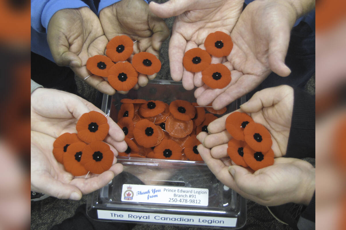 Inmates at the William Head Institution show off their Royal Canadian Legion Branch 91 poppy box. Since at least 2016, inmates at the institution have been making donations to the West Shore Legion’s poppy campaign. (Courtesy of William Head Institution)