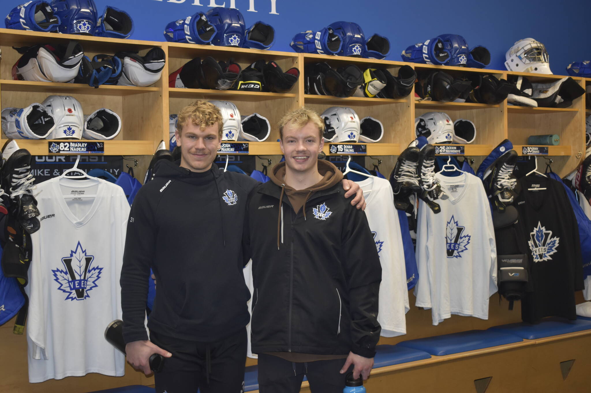 Luca Di Pasquo (left) and Hank Levy in the Penticton Vees locker room one week after helping save a man who was unresponsive in a sauna room. (Logan Lockhart- Western News)