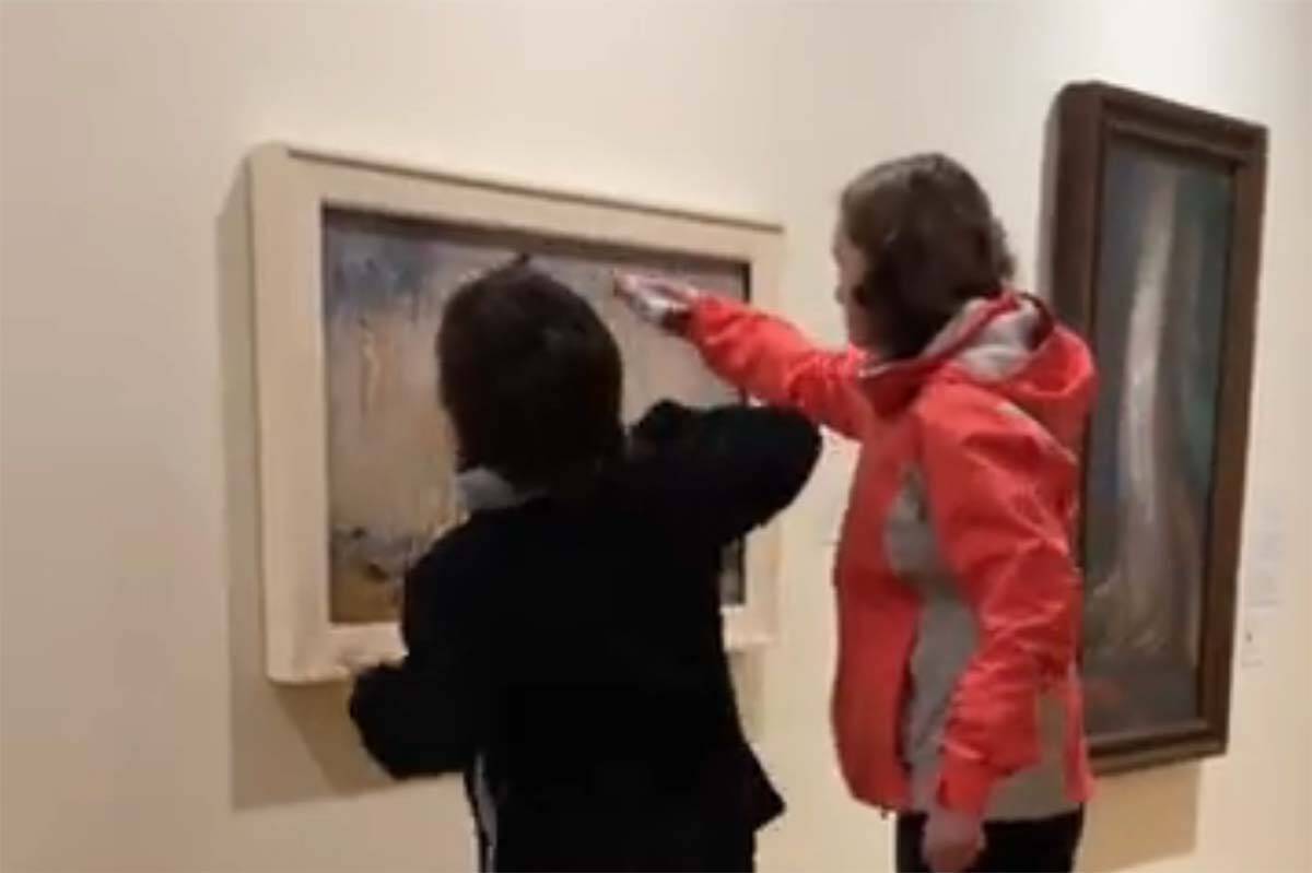 Members of an environmental group called Stop Fracking Around threw maple syrup on an Emily Carr painting at the Vancouver Art Gallery on Nov. 12. (Twitter/@StopFrackingA/Screenshot)