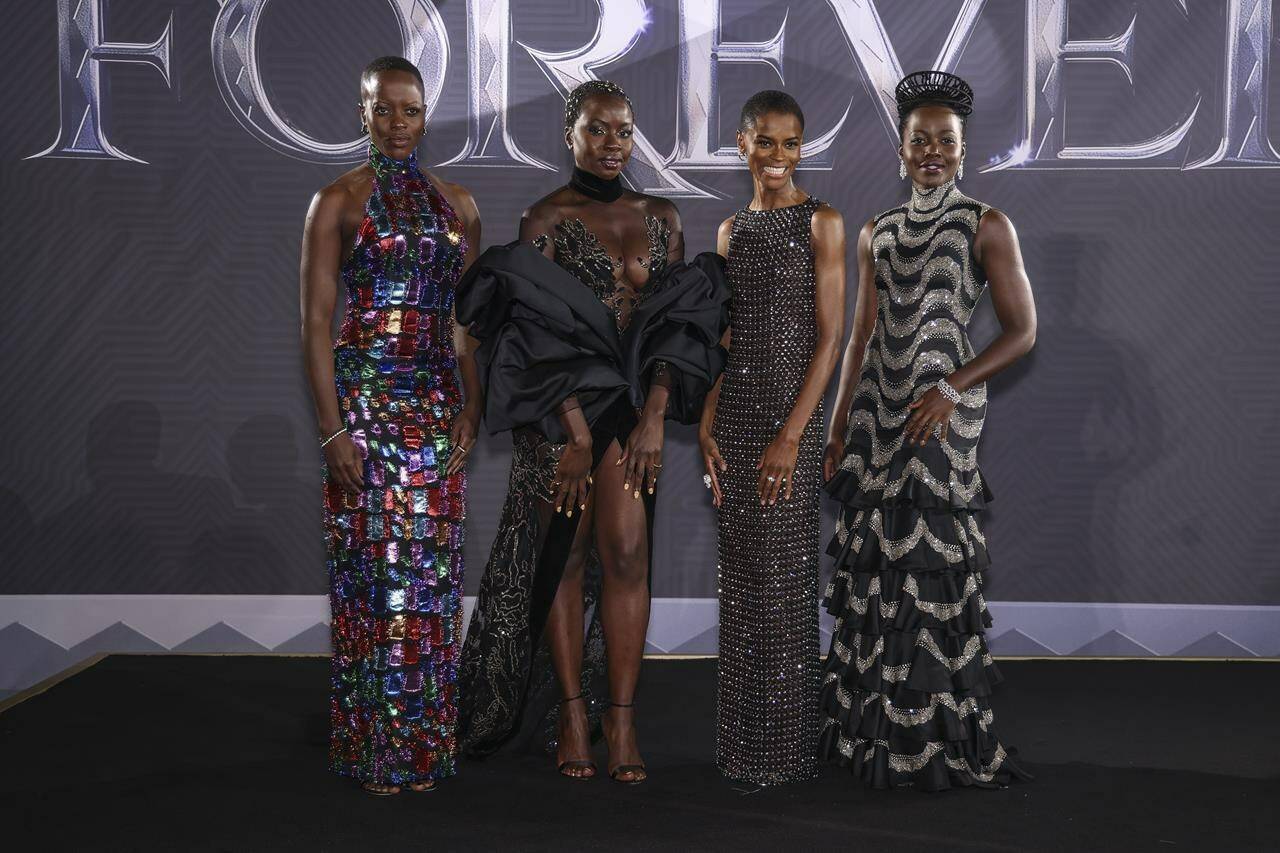 Florence Kasumba, from left, Danai Gurira, Letitia Wright and Lupita Nyong’o pose for photographers upon arrival for the premiere of the film ‘Black Panther: Wakanda Forever’ in London, Thursday, Nov. 3, 2022. (Photo by Vianney Le Caer/Invision/AP)
