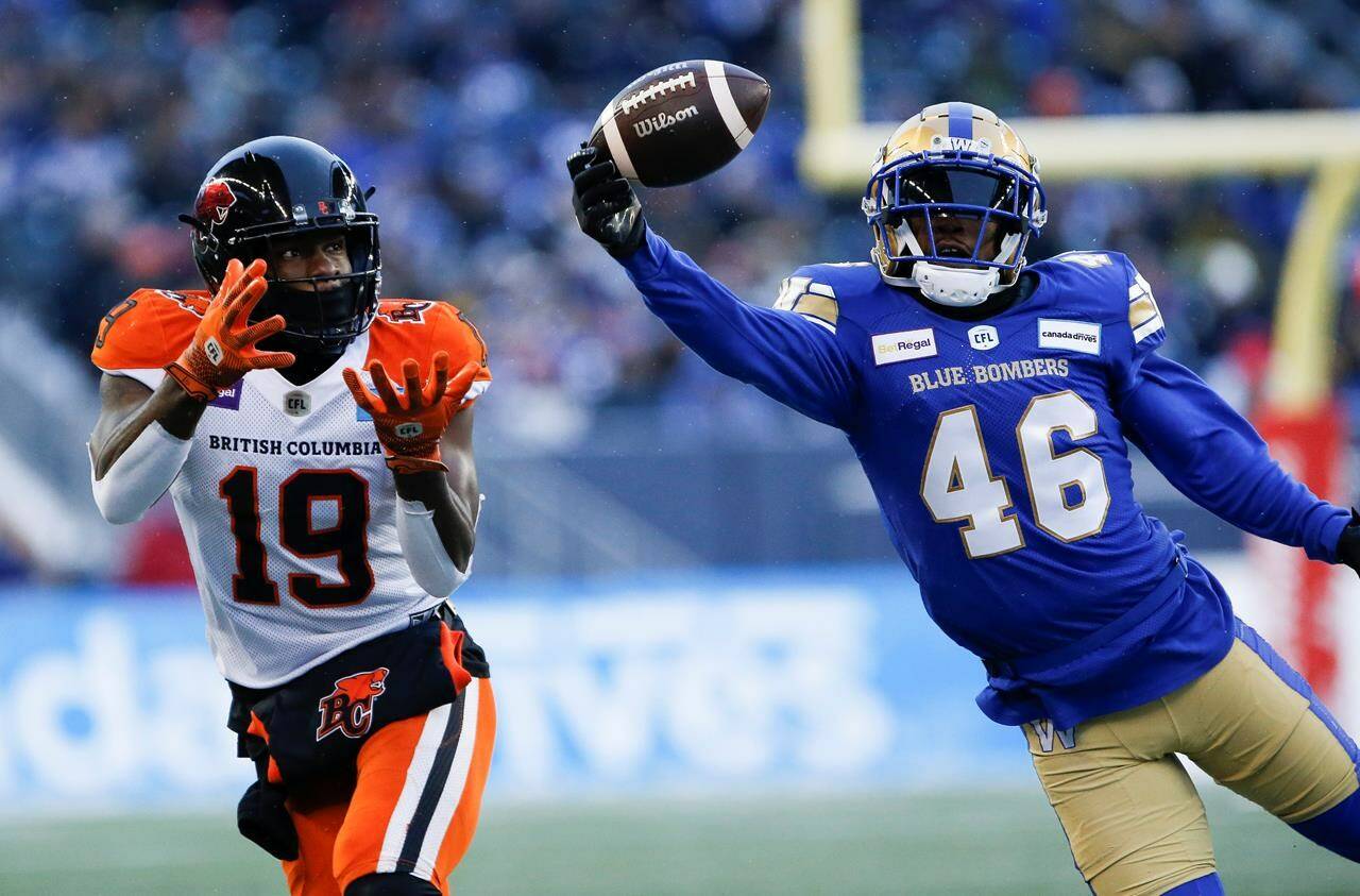 Winnipeg Blue Bombers’ Desmond Lawrence (46) knocks down a pass intended for BC Lions’ Dominique Rhymes (19) during the first half of CFL western final action in Winnipeg, Sunday, Nov. 13, 2022. THE CANADIAN PRESS/John Woods