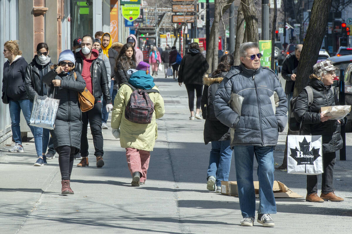 Pedestrians walk down St. Catherine Street, Monday,  April 6, 2020 in Montreal. Statistics Canada plans to provide an updated look at immigration data and our ethno-cultural and religious diversity today in new round of data from the 2021 census.THE CANADIAN PRESS/Ryan Remiorz