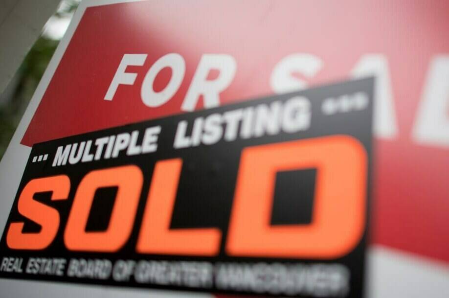 A real estate sign is pictured in Vancouver, B.C., Tuesday, June, 12, 2018. The Canadian Real Estate Association says home sales in October were up 1.3 per cent from September, the first monthly gain since February. THE CANADIAN PRESS Jonathan Hayward