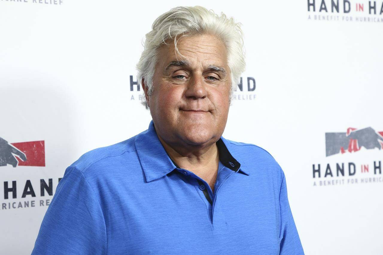 FILE - Jay Leno attends the Hand in Hand: A Benefit for Hurricane Harvey Relief in Los Angeles on Sept. 12, 2017. Jay Leno suffered burns in a weekend fire at the car enthusiast’s garage but said Monday that he was doing OK, according to reports. Leno, 72, had been set to appear at a financial conference in Las Vegas on Sunday but canceled because of a “serious medical emergency.” (Photo by John Salangsang/Invision/AP, File)