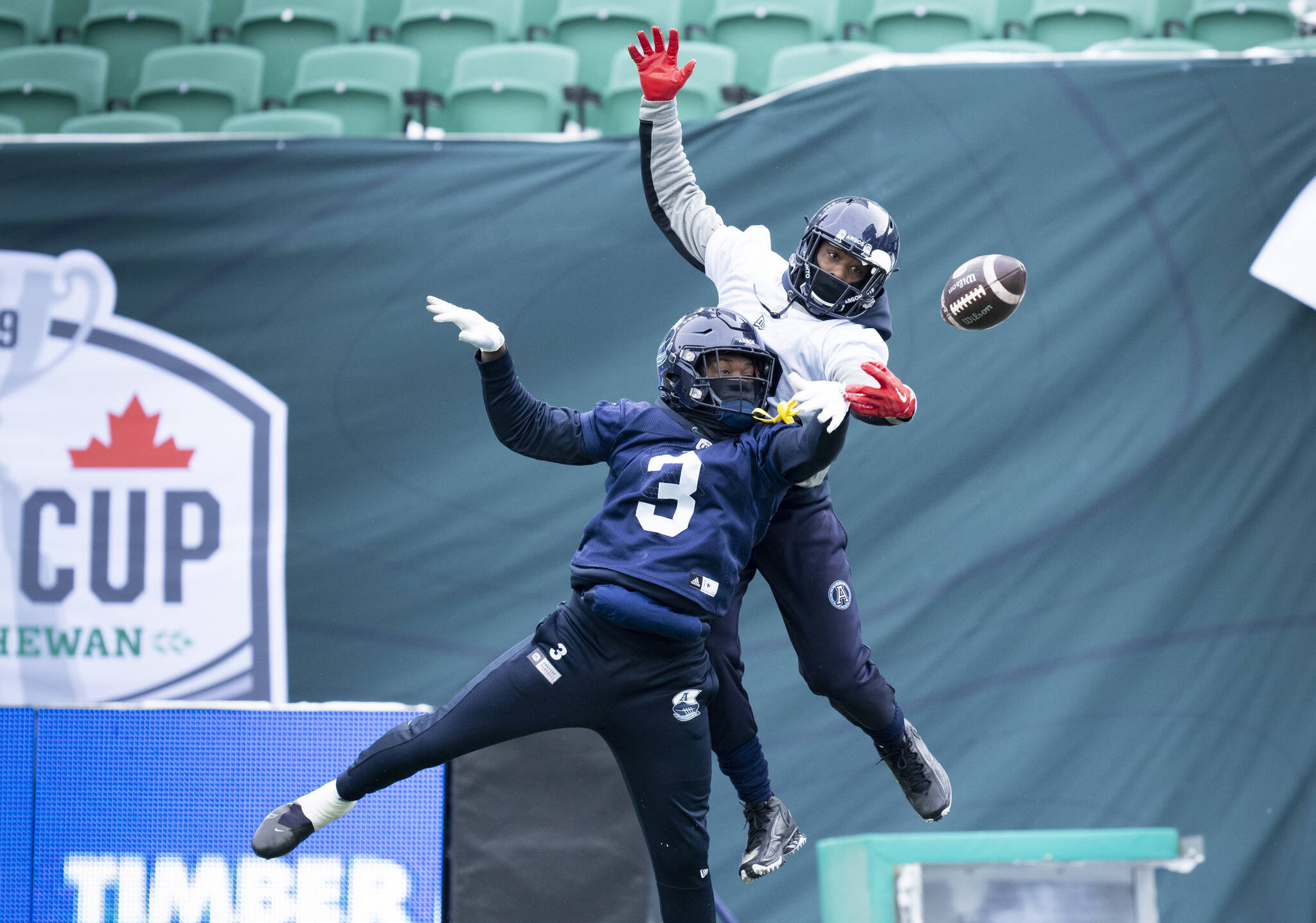 Toronto Argonauts defensive back Jamal Peters breaks up a pass intended for wide receiver Dejon Brissett during a practice in Regina, Friday, Nov. 18, 2022. The Toronto Argonauts will be playing against the Winnipeg Blue Bombers in the 109th Grey Cup on Sunday. THE CANADIAN PRESS/Paul Chiasson