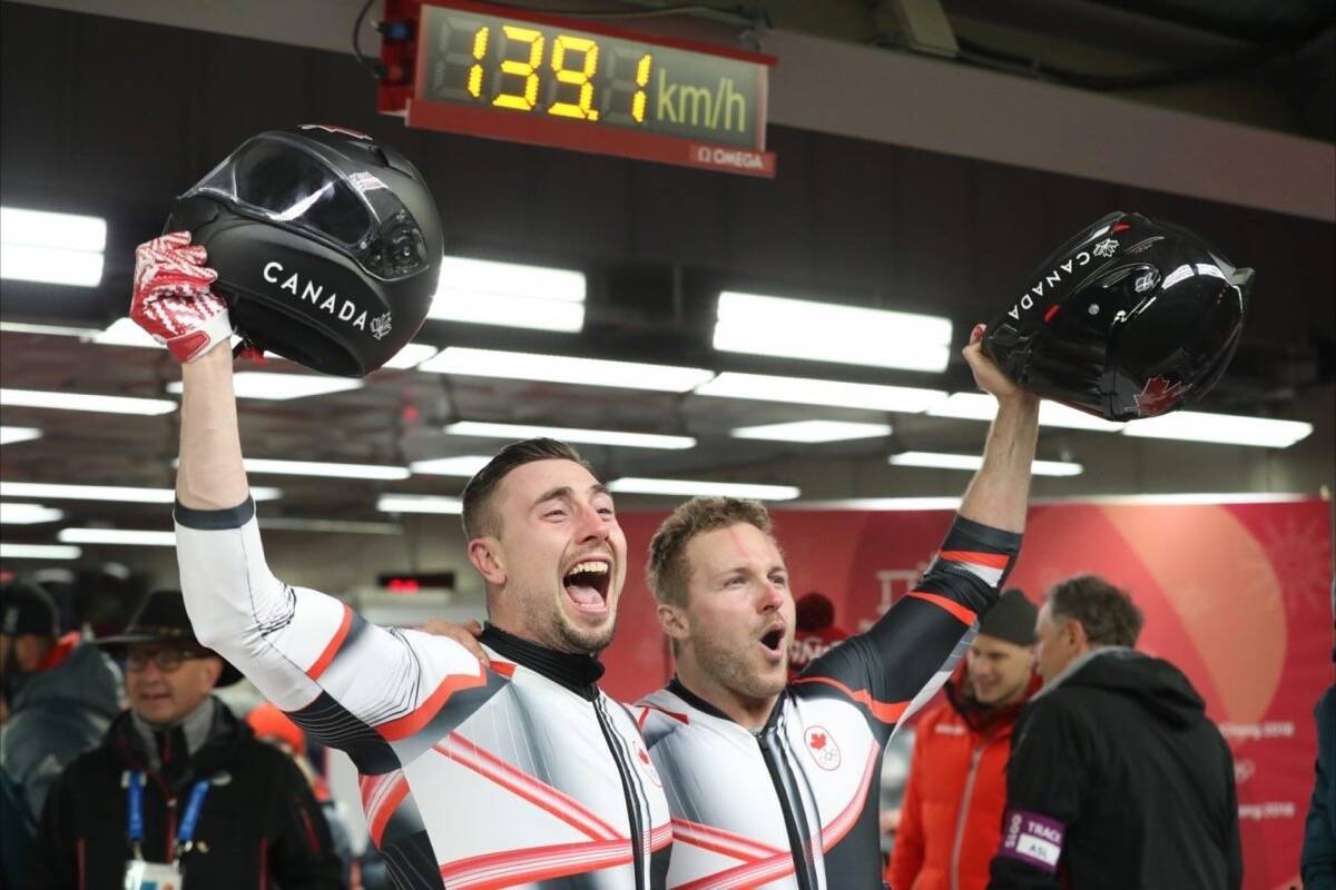 Team Canada’s Justin Kripps and Alex Kopacz celebrate their gold medal in the men’s two-man bobsleigh event at PyeongChang 2018. Which other team won gold in this event? (David Jackson/COC)