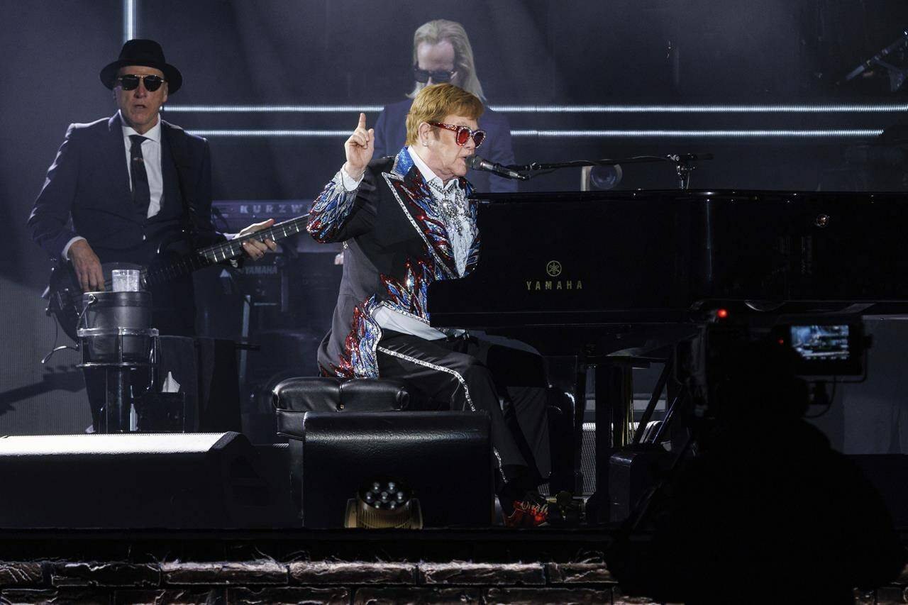 Sir Elton John performs live at the Elton John's final North American show of his "Farewell Yellow Brick Road" tour on Sunday, Nov. 20, 2022, at the Dodger Stadium in Los Angeles. (Photo by Willy Sanjuan/Invision/AP)