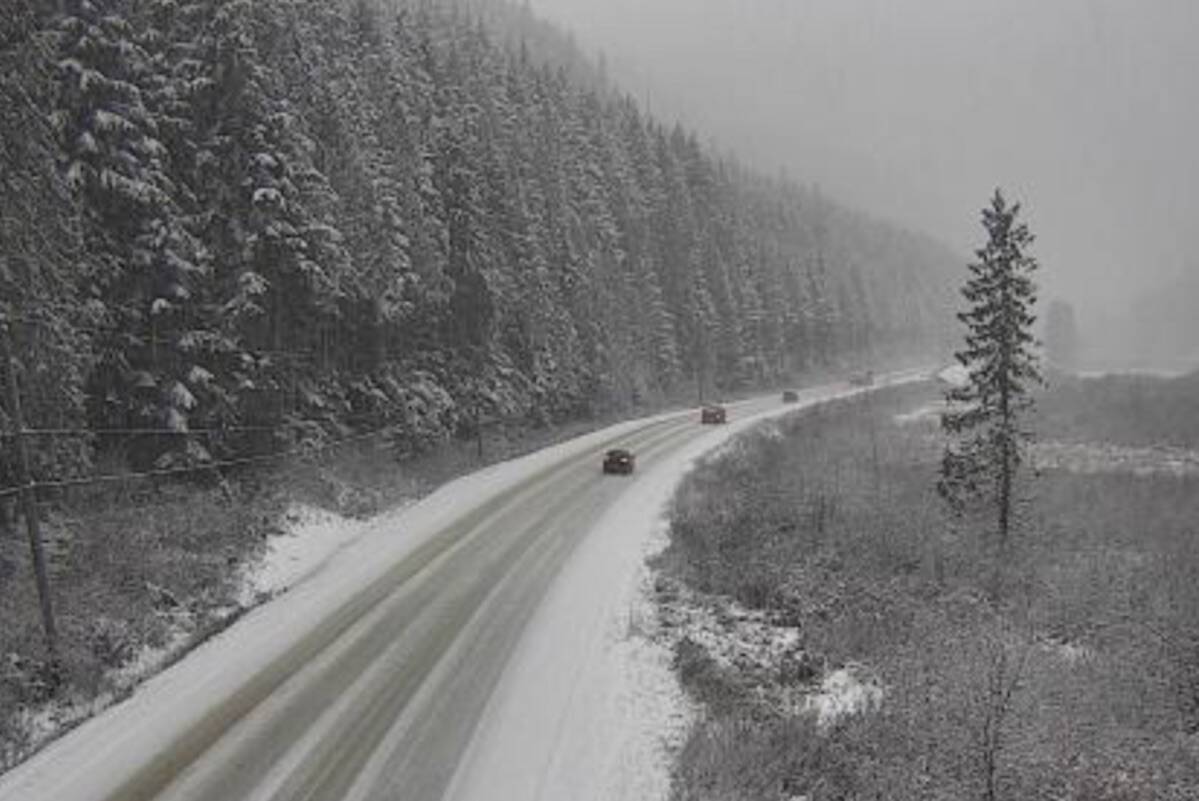 Eagle Pass, 33 kilometres west of Revelstoke, is starting to experience snow from the snowfall warning in effect on Tuesday, Nov. 22 for all major Okanagan highways, as they are expecting 15-20 centimetres of snow is 24 hours (Photo - DriveBC)