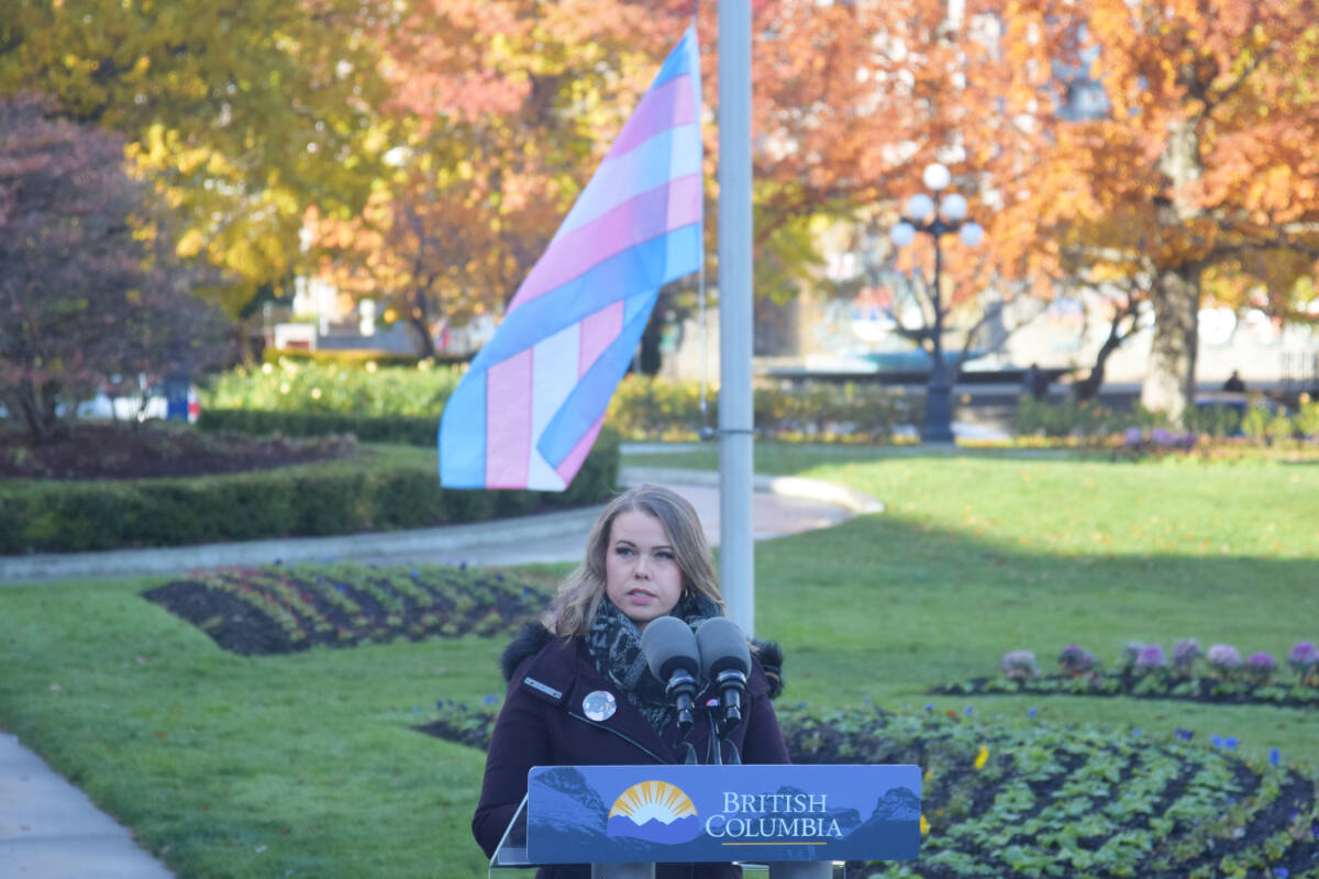 Ace Mann, secretary of the Victoria Pride Society, speaks on the front lawn of the B.C. legislature on Sunday (Nov. 20) to mark Transgender Day of Remembrance. (Austin Westphal/News Staff)