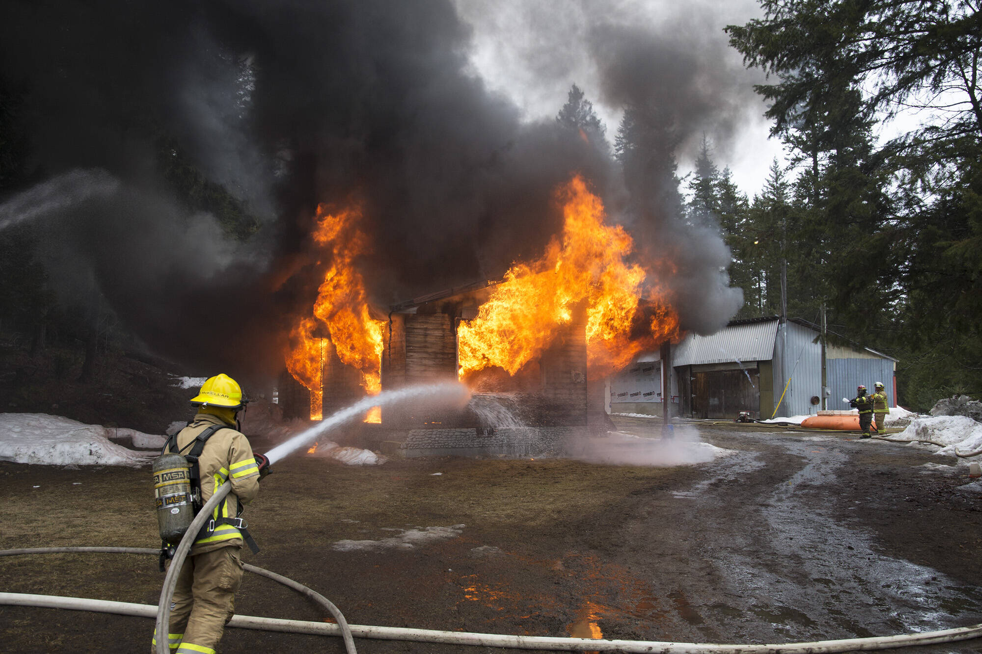 Firefighters from the Malakwa Fire Department and others from the Shuswap participate in a live-burn training exercise. (File Photo)