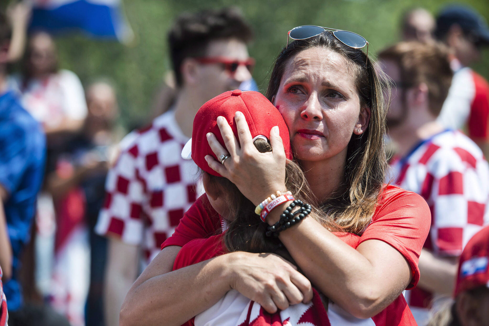 Croatia soccer fans react during a live screening of the 2018 FIFA World Cup final between France and Croatia, in Our Lady Queen-Croatia park in Mississauga, Ont. on Sunday, July 15, 2018. THE CANADIAN PRESS/Christopher Katsarov