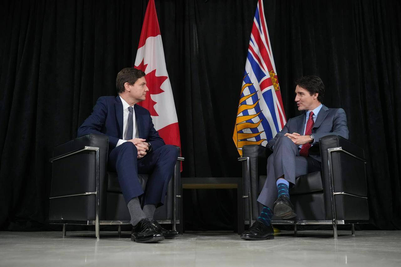 Prime Minister Justin Trudeau, right, meets with B.C. Premier David Eby before an announcement at the Richmond Jewish Day School, in Richmond, B.C., on Friday, December 2, 2022. THE CANADIAN PRESS/Darryl Dyck