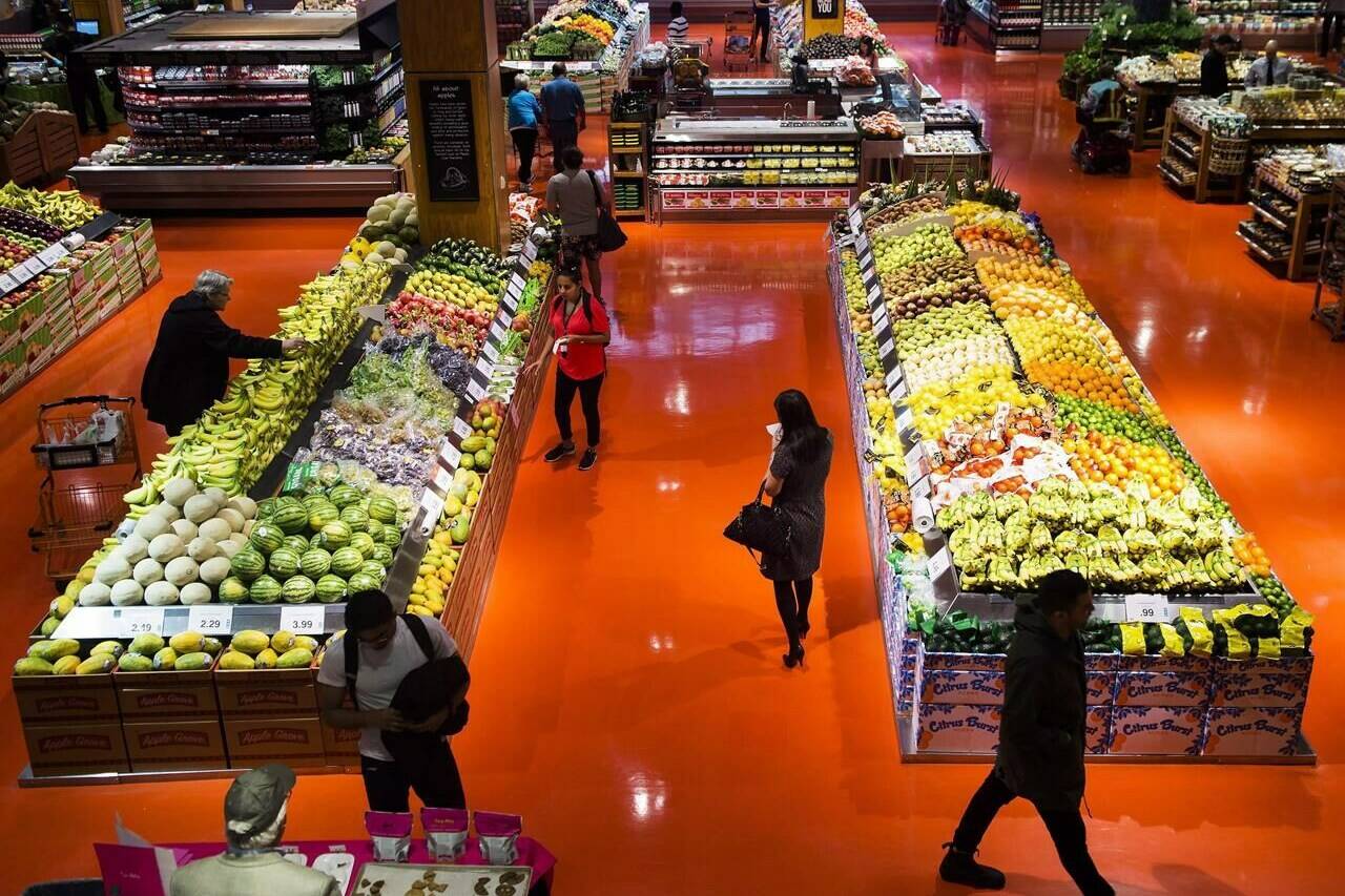People shop at a Loblaws store in Toronto on May 3, 2018. THE CANADIAN PRESS/Nathan Denette