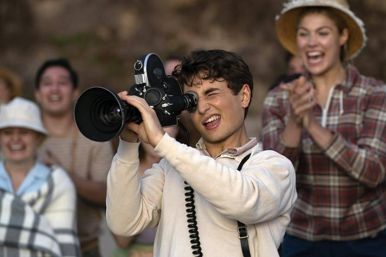 This image released by Universal Pictures and Amblin Entertainment shows Gabriel LaBelle in a scene from “The Fabelmans.” (Merie Weismiller Wallace/Universal Pictures and Amblin Entertainment via AP)