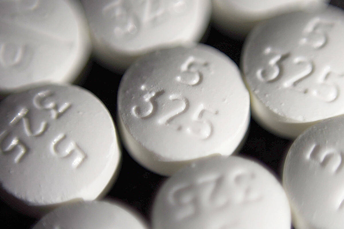 FILE - Vancouver police say a sophisticated crime ring was lacing Percocet pills with fentanyl to get people addicted. The department has arrested three people believed to have been involved in the trafficking, since the police investigation began in November 2021. (AP Photo/Patrick Sison, File)