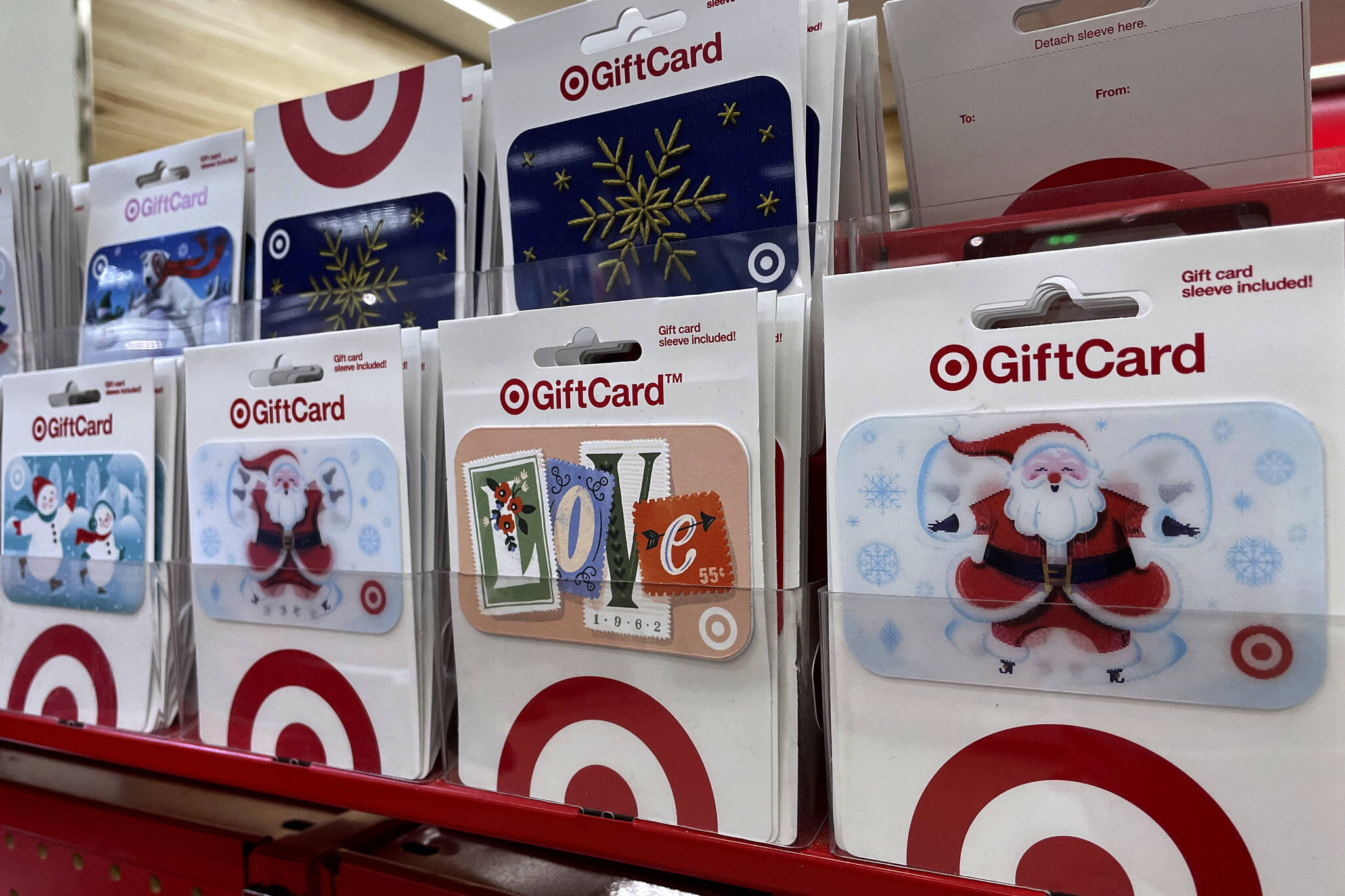 The Better Business Bureau is warning shoppers of a scam involving barcodes being swapped on gift cards. (AP Photo/Nam Y. Huh)