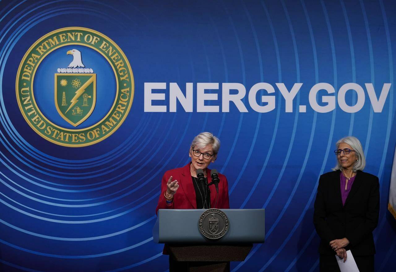 Secretary of Energy Jennifer Granholm, joined at right by Arati Prabhakar, the president’s science adviser, announces a major scientific breakthrough in fusion research that was made at the Lawrence Livermore National Laboratory in California, during a news conference at the Department of Energy in Washington, Tuesday, Dec. 13, 2022. (AP Photo/J. Scott Applewhite)