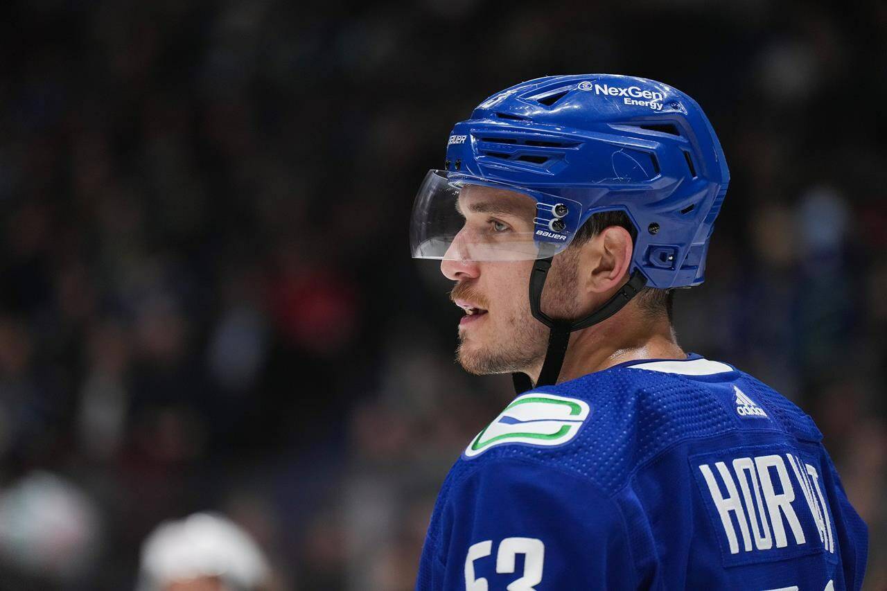 Vancouver Canucks’ Bo Horvat waits to take a faceoff against the Washington Capitals during the first period of an NHL hockey game in Vancouver, on Tuesday, November 29, 2022. Vancouver Canucks captain Bo Horvat says he’s focused on playing hockey as talk picks up about his future with the team.THE CANADIAN PRESS/Darryl Dyck