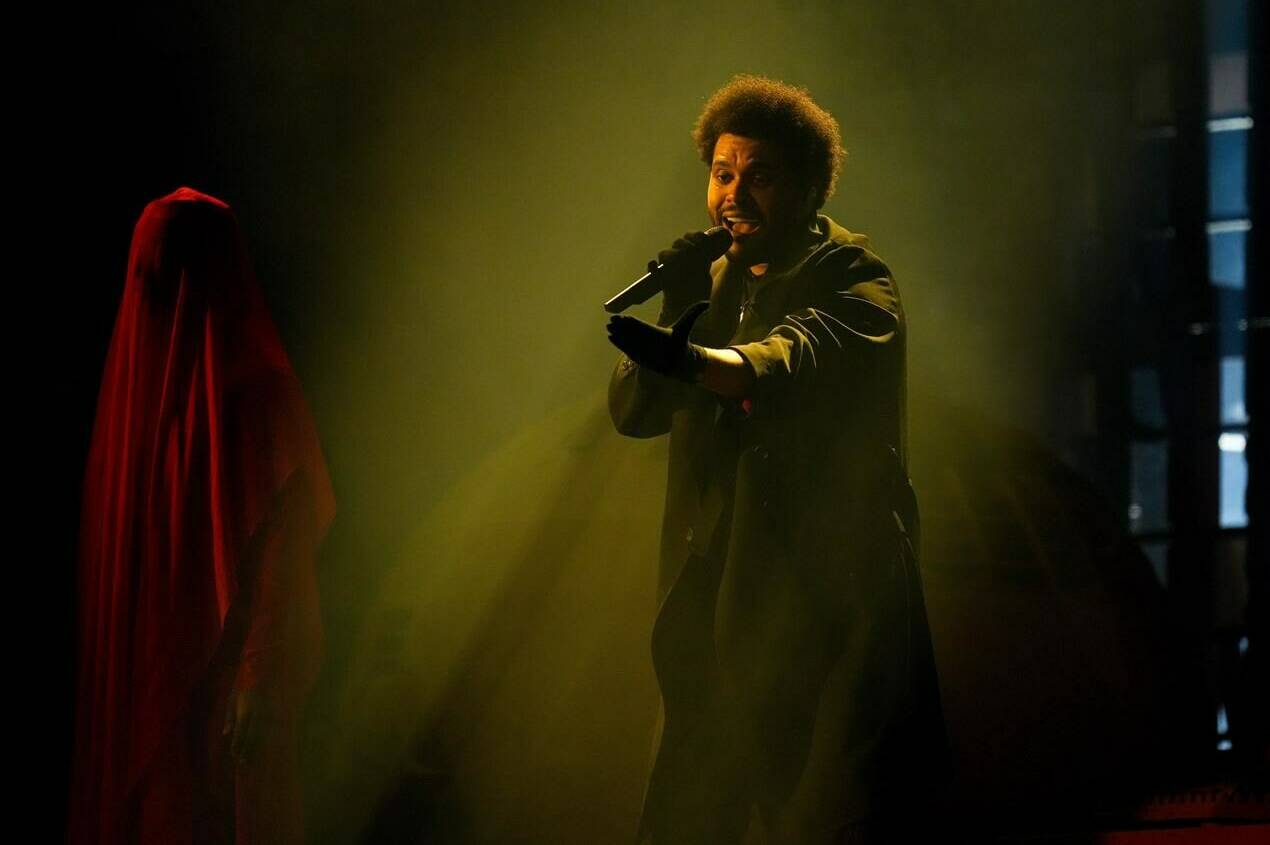 The Weeknd performs in Vancouver, on Tuesday, August 23, 2022. The Canadian pop superstar has received the 2022 Allan Slaight Humanitarian Spirit Award. THE CANADIAN PRESS/Darryl Dyck