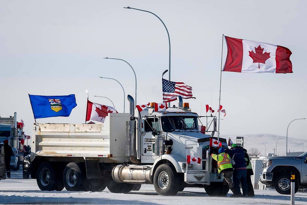 A protest blockade at the United States border in Coutts, Alta., Wednesday, Feb. 2, 2022. THE CANADIAN PRESS/Jeff McIntosh