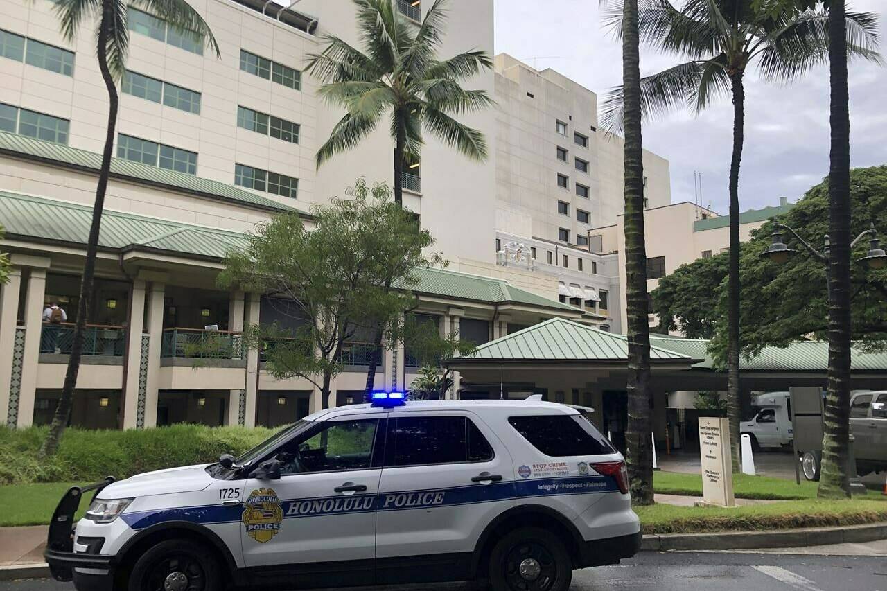 This photo shows the exterior of The Queen’s Medical Center in Honolulu where some patients injured by air turbulence on a Hawaiian Airlines flight from Phoenix to Honolulu were taken, Sunday, Dec. 18, 2022. (AP Photo/Audrey McAvoy)