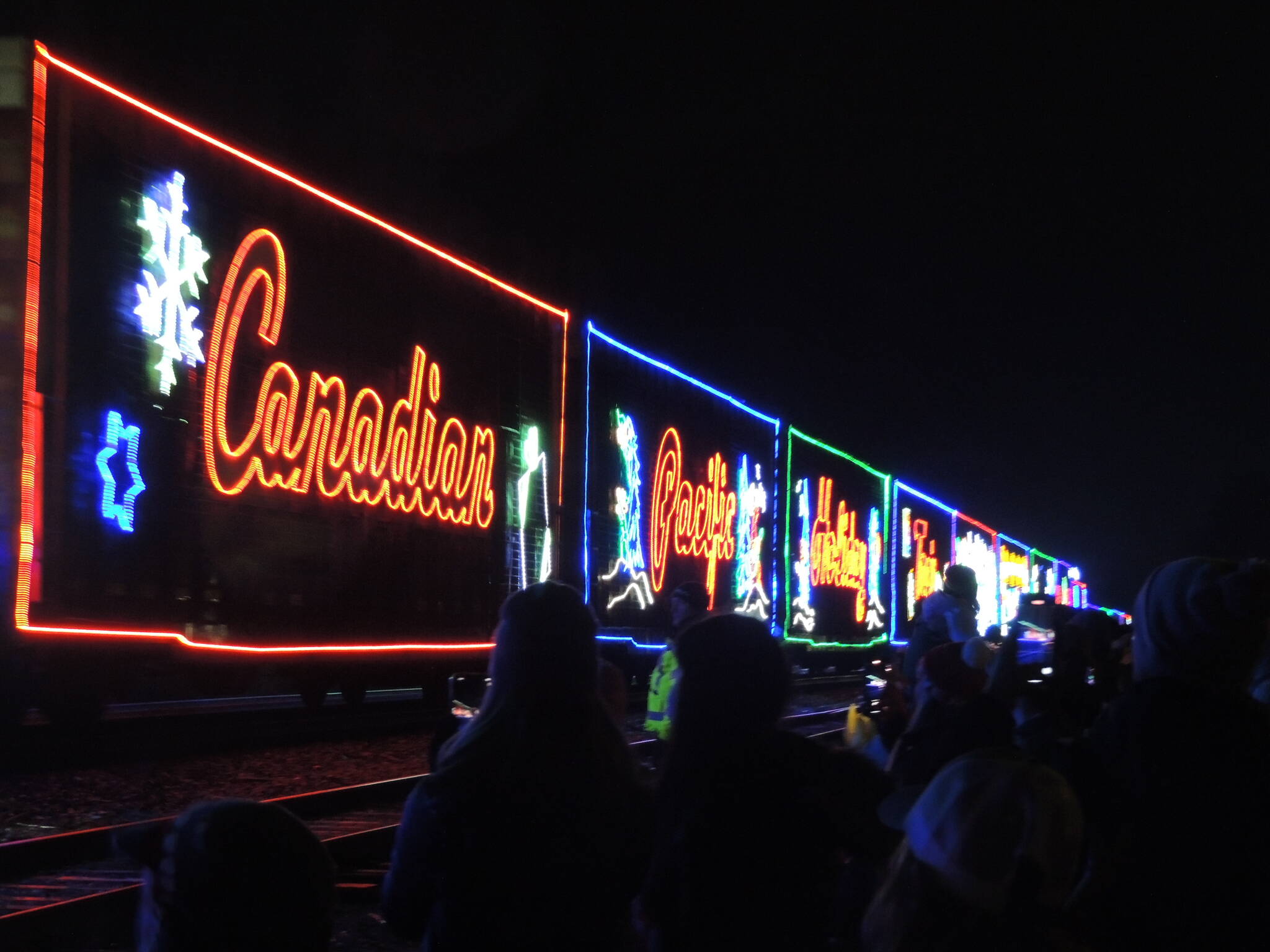 The CP Holiday Train stopped in Agassiz this weekend for the first time in three years. Hundreds of people lined the tracks to check out the holiday display on wheels. (Adam Louis/Observer)