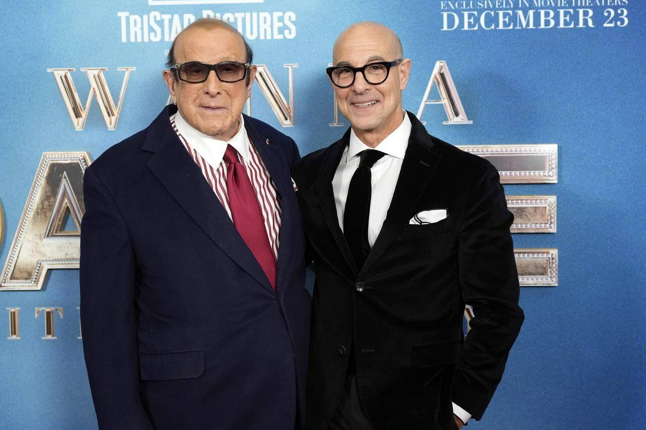Stanley Tucci, left, and Clive Davis attend the world premiere of "Whitney Houston: I Wanna Dance with Somebody" at AMC Lincoln Square on Tuesday, Dec. 13, 2022, in New York. (Photo by Charles Sykes/Invision/AP)