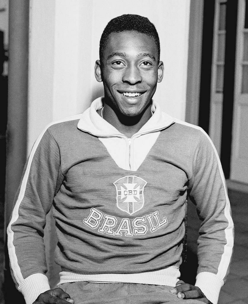 FILE - Brazil’s Pele wears his national team’s jersey in Rio de Janeiro, Brazil, May 25, 1962. Pelé, the Brazilian king of soccer who won a record three World Cups and became one of the most commanding sports figures of the last century, died in Sao Paulo on Thursday, Dec. 29, 2022. He was 82. (AP Photo, File)