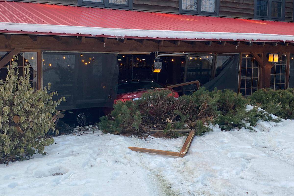 A vehicle is seen sitting inside Montana’s restaurant on Highway 97 in Kelowna. (Photo/Jen Zielinski)