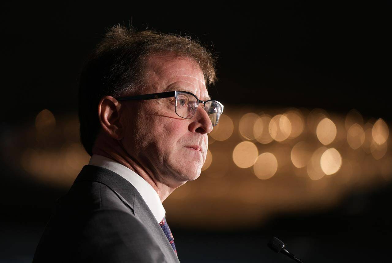 B.C. Health Minister Adrian Dix pauses while responding to questions during a news conference, in Vancouver, on Monday, Nov. 7, 2022. Dix says he supports the federal government’s decision to temporarily require people flying from China, Hong Kong and Macao to test negative for COVID-19 before leaving for Canada, beginning in early January. THE CANADIAN PRESS/Darryl Dyck