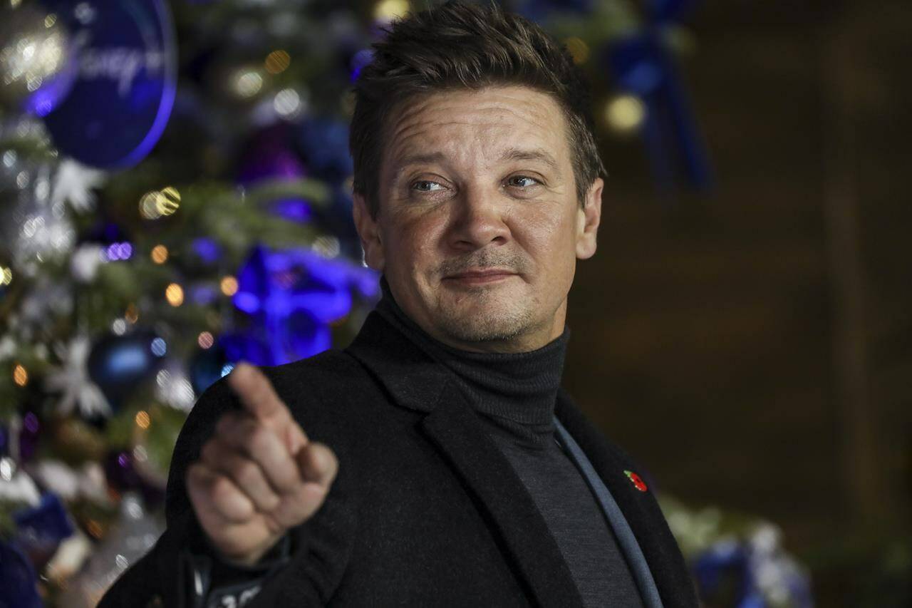 FILE - Jeremy Renner poses for photographers upon arrival at the UK Fan Screening of the film “Hawkeye,” in London, Thursday, Nov. 11, 2021. Renner is being treated for serious injuries that happened while he was plowing snow. The actor’s representative said Sunday, Jan. 1, 2023, that Renner is in critical condition although he is stable. (Photo by Vianney Le Caer/Invision/AP, File)