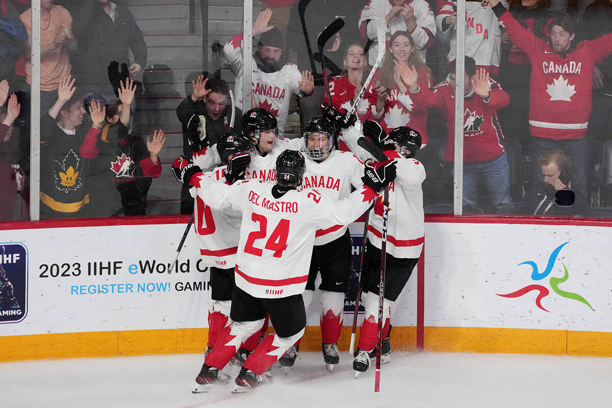 Canada celebrate a goal by Joshua Roy during second period IIHF World Junior Hockey Championship semifinal action against USA in Halifax on Wednesday, January 4, 2023. THE CANADIAN PRESS/Darren Calabrese