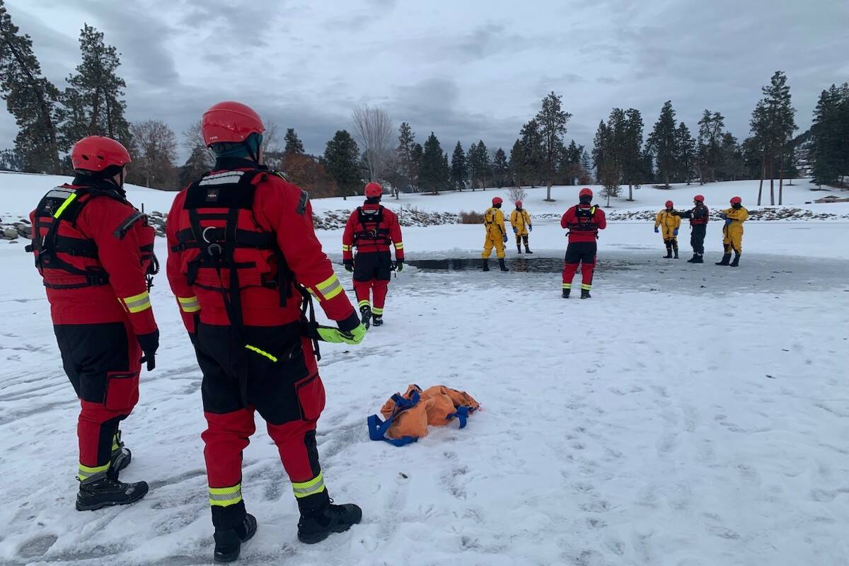Kelowna Fire Department on the ice at Kelowna Golf and Country Club for cold water training on Jan. 5, 2023. (Brittany Webster/Capital News)