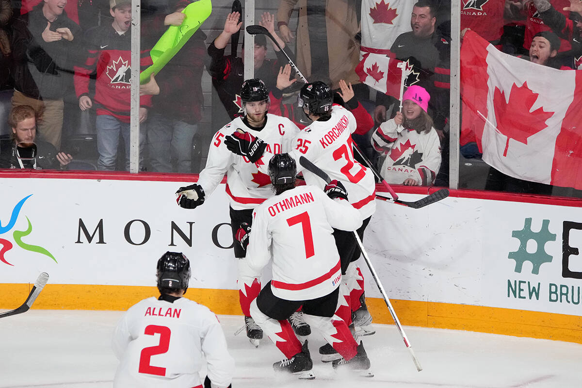 Canada’s Shane Wright, top left, celebrates his goal with teammates during second period IIHF World Junior Hockey Championship gold medal action against Czechia in Halifax on Thursday, January 5, 2023. THE CANADIAN PRESS/Darren Calabrese