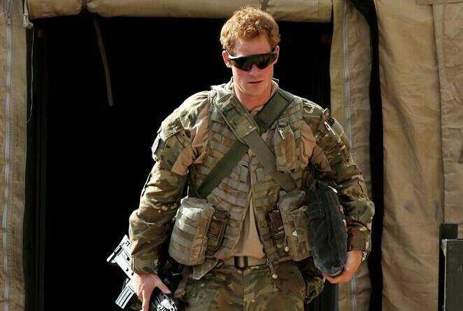 FILE Britain’s Prince Harry or just plain Captain Wales as he is known in the British Army, at the British controlled flight-line in Camp Bastion southern Afghanistan, Oct. 31, 2012. Prince Harry alleges in a much-anticipated new memoir that his brother Prince William lashed out and physically attacked him during a furious argument over the brothers’ deteriorating relationship. The book “Spare” also included incendiary revelations about the estranged royal’s drug-taking, first sexual encounter and role in killing people during his military service in Afghanistan, (John Stillwell, Pool Photo via AP, File)