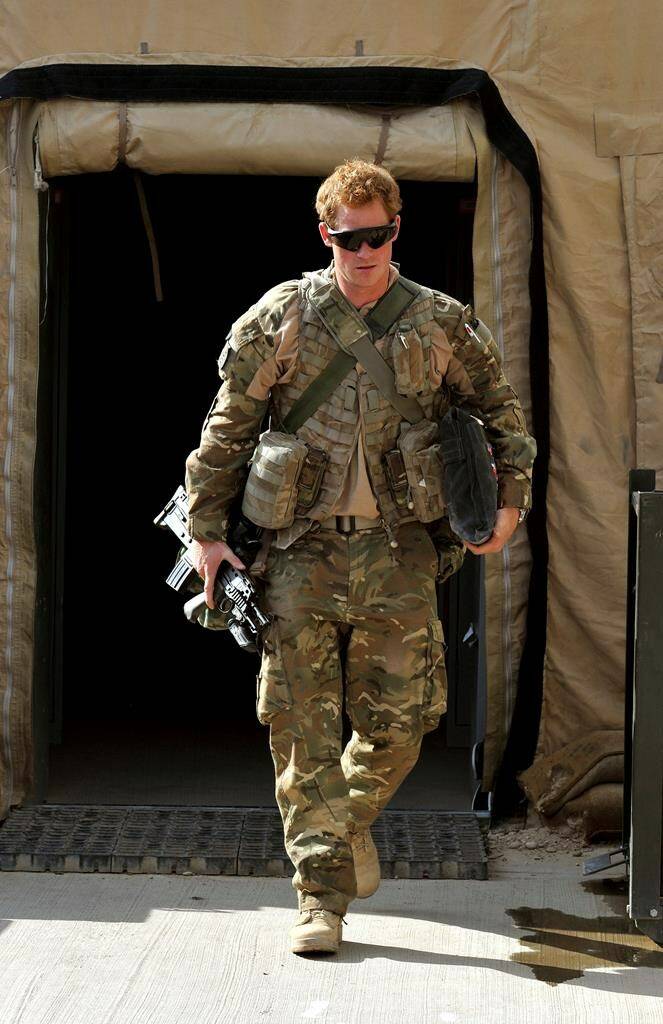 FILE Britain’s Prince Harry or just plain Captain Wales as he is known in the British Army, at the British controlled flight-line in Camp Bastion southern Afghanistan, Oct. 31, 2012. Prince Harry alleges in a much-anticipated new memoir that his brother Prince William lashed out and physically attacked him during a furious argument over the brothers’ deteriorating relationship. The book “Spare” also included incendiary revelations about the estranged royal’s drug-taking, first sexual encounter and role in killing people during his military service in Afghanistan, (John Stillwell, Pool Photo via AP, File)