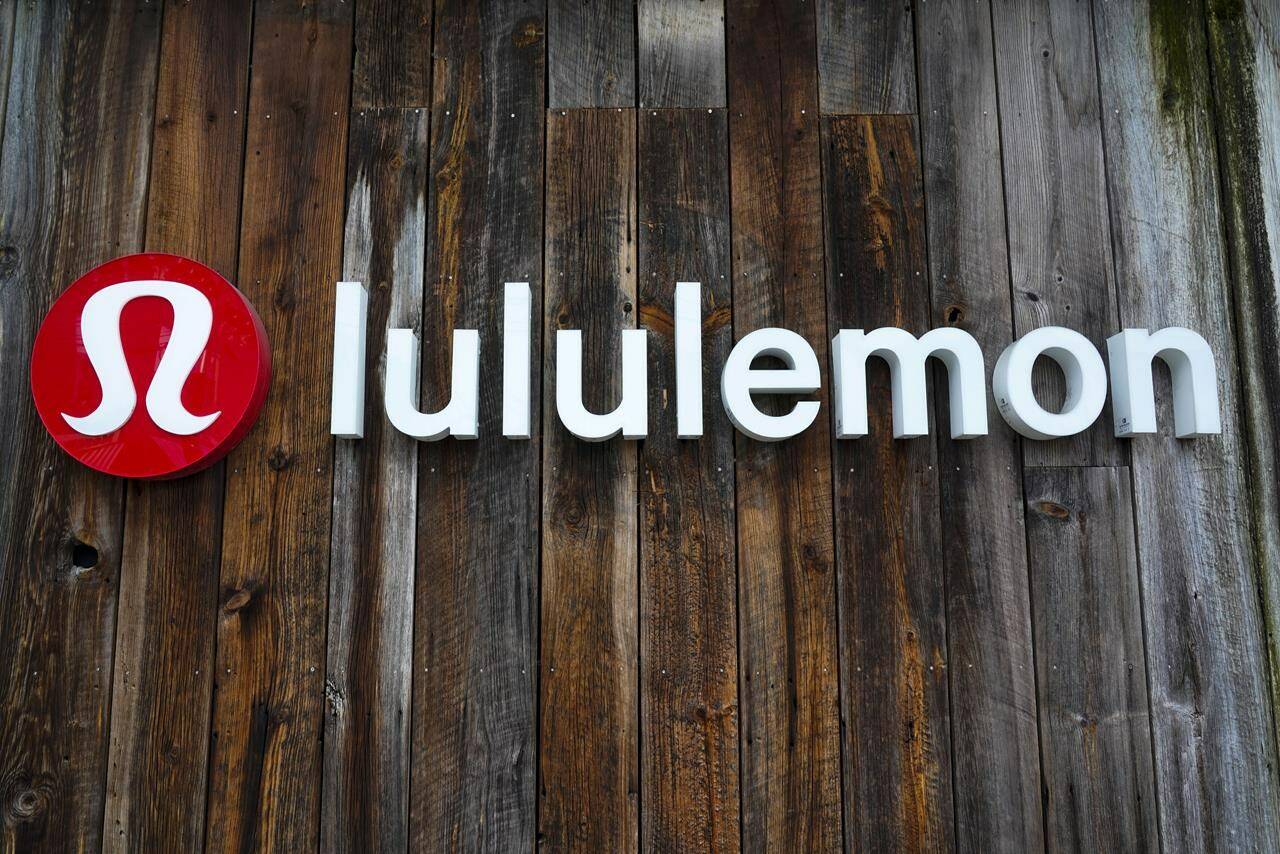 This is the sign on a Lululemon store in Pittsburgh on Wednesday, Jan. 12, 2022. Lululemon Athletica Inc. raised its revenue guidance for its fourth quarter, but lowered its expectations for its gross margins. THE CANADIAN PRESS/AP-Gene J. Puskar