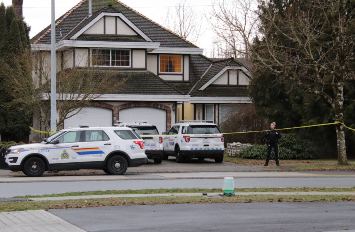 Police say three people were found dead inside this Surrey home on Monday (Jan. 9). (Photo: Shane MacKichan)