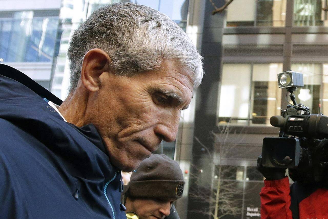 FILE - In this March 12, 2019, file photo, William “Rick” Singer, founder of the Edge College & Career Network, departs federal court in Boston after pleading guilty to charges in a nationwide college admissions bribery scandal. In the wake of the college admissions bribery scandal, experts say there’s little evidence that it stirred significant change in the world of college admissions. (AP Photo/Steven Senne, File)