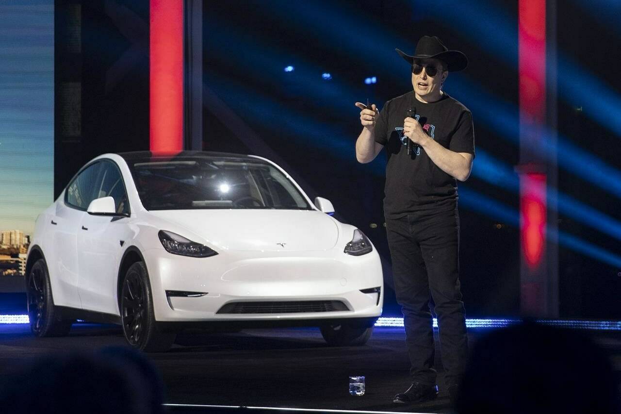 FILE - Tesla CEO Elon Musk speaks at the “Cyber Rodeo” grand opening celebration for the new $1.1 billion Tesla Giga Texas manufacturing facility in Austin, Texas, on April 7, 2022. Musk claimed in an August 7, 2018 tweet that he had lined up the financing to pay for a $72 billion buyout of Tesla, which he then amplified with a follow-up statement that made a deal seem imminent. But the buyout never materialized and now Musk will have to explain his actions under oath in a federal court in San Francisco on Tuesday, Jan. 17, 2023. (Jay Janner/Austin American-Statesman via AP, File)