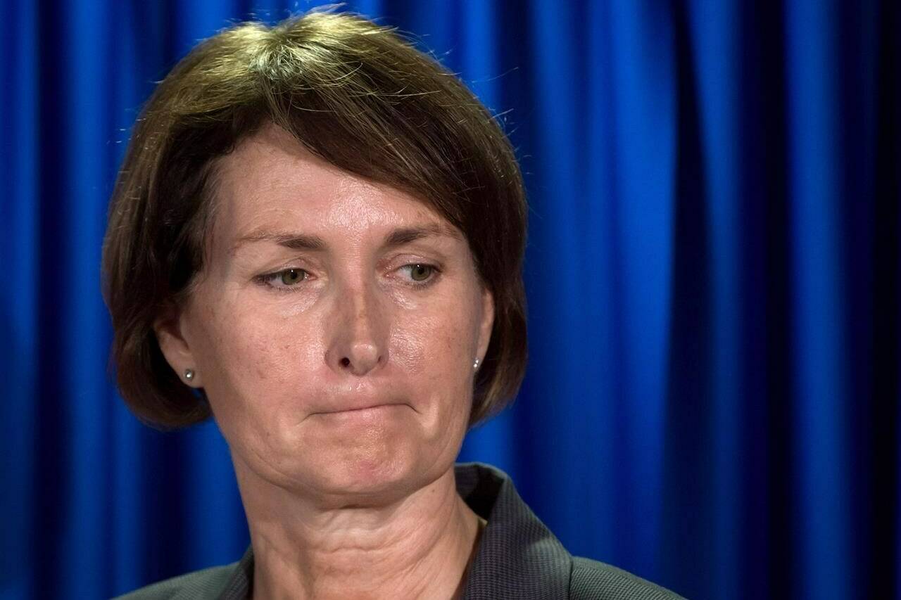 Former B.C. Representative for Children and Youth Mary Ellen Turpel-Lafond listens during a news conference after releasing a joint report with the B.C. Information and Privacy Commissioner about cyberbullying, in Vancouver, B.C., on Friday Nov. 13, 2015. Six out of 10 universities say they’re reviewing honorary degrees conferred on \Turpel-Lafond, after being asked by a group of Indigenous women to revoke them following a CBC investigation into her claims of Indigenous heritage. THE CANADIAN PRESS/Darryl Dyck