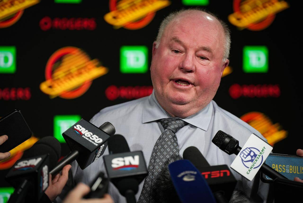 Vancouver Canucks head coach Bruce Boudreau responds to questions during a news conference after an NHL hockey game against the Edmonton Oilers, in Vancouver, on Saturday, January 21, 2023. The Vancouver Canucks have fired head coach Bruce Boudreau and hired Rick Tocchet as his replacement. THE CANADIAN PRESS/Darryl Dyck