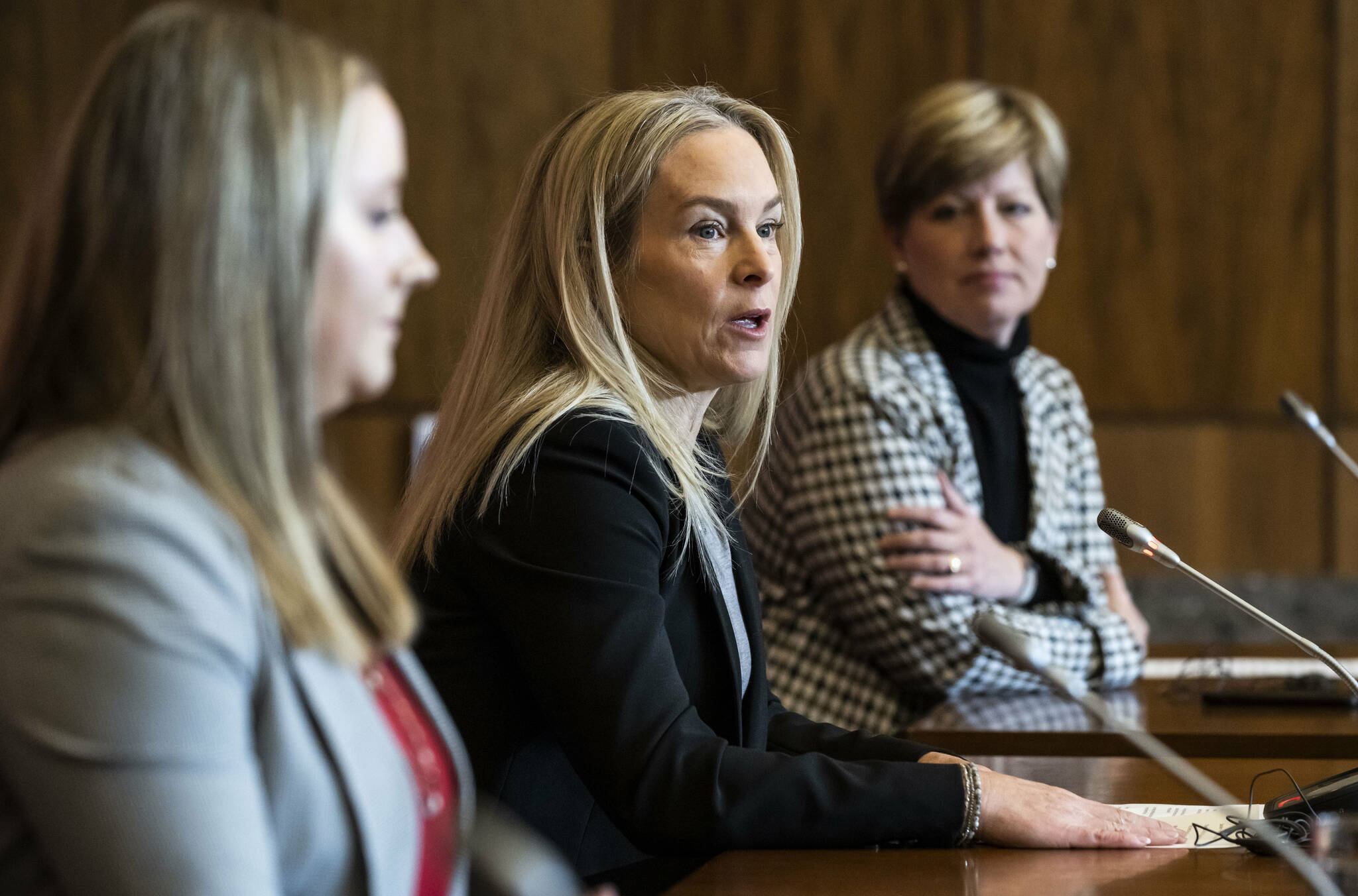 Kim Shore, co-founder of Gymnasts Gymnasts for Change Canada, centre, participates in a news conference on sexual misconduct allegations at Gymnastics Canada along with Conservative Karen Vecchio, right, in Ottawa, on Tuesday, Nov. 22, 2022. THE CANADIAN PRESS/Justin Tang