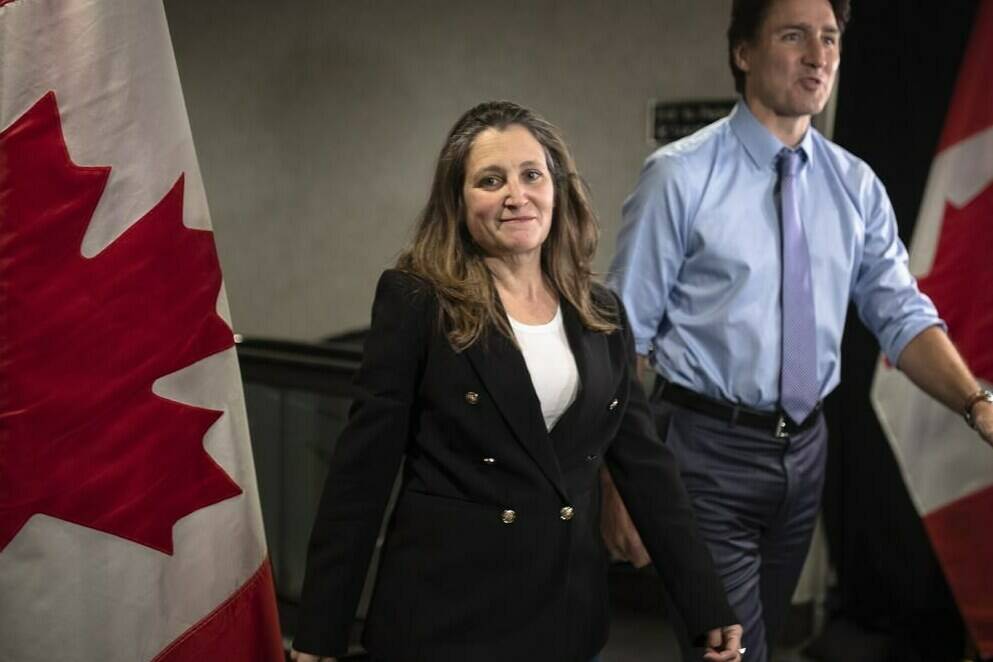 Deputy Prime Minister and Finance Minister Chrystia Freeland, along with Prime Minister Justin Trudeau, arrive at the Hamilton Convention Centre, in Hamilton, Ont., ahead of the Liberal Cabinet retreat, on Monday, January 23, 2023. THE CANADIAN PRESS/Nick Iwanyshyn