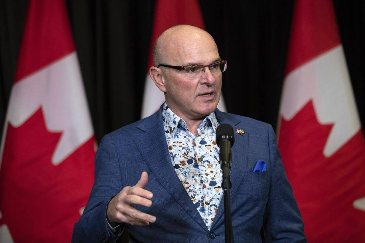 Minister of Tourism and Associate Minister of Finance Randy Boissonnault speaks to the media at the Hamilton Convention Centre in Hamilton during the second day of meetings at Liberal Cabinet retreat, on Tuesday, January 24, 2023. THE CANADIAN PRESS/Nick Iwanyshyn