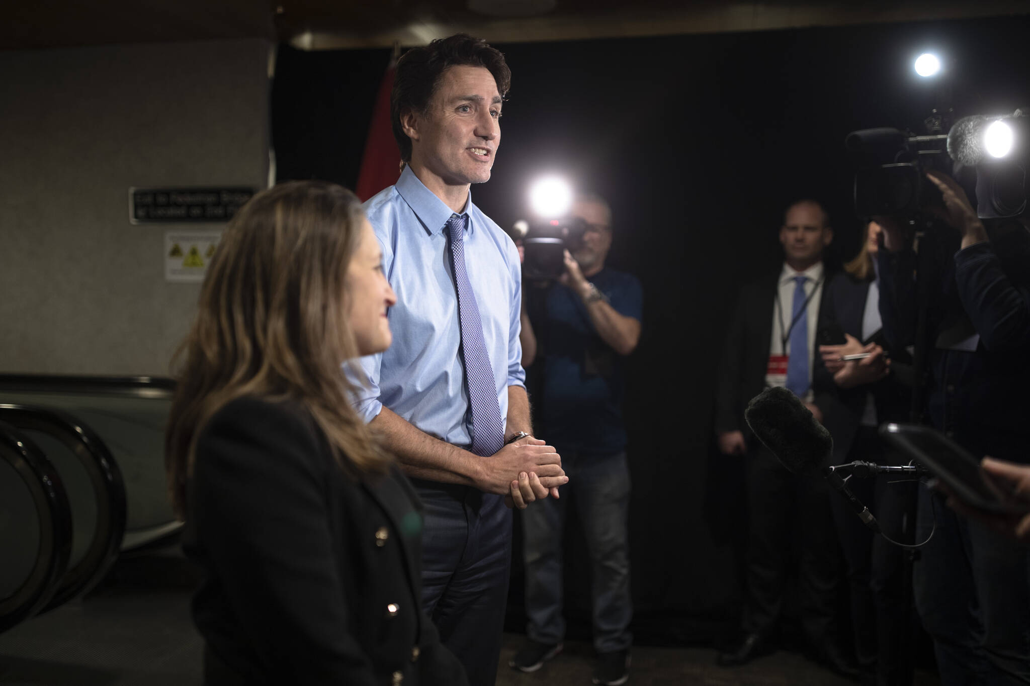 Prime Minister Justin Trudeau, joined by Deputy Prime Minister and Finance Minister Chrystia Freeland, speaks to the media at the Hamilton Convention Centre, in Hamilton, Ont., ahead of the Liberal Cabinet retreat, on Monday, January 23, 2023. THE CANADIAN PRESS/Nick Iwanyshyn