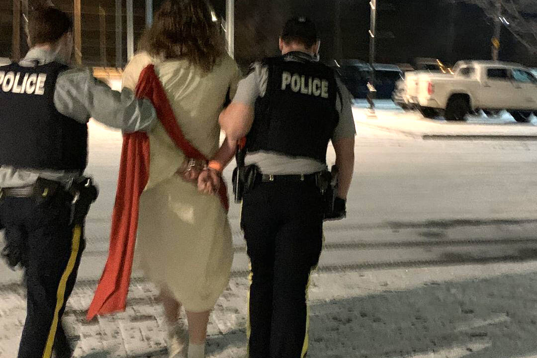 An unidentified man dressed as Jesus was escorted out of the Anthrax concert by Penticton police on Jan. 21. (Sarah Tucker-Facebook)